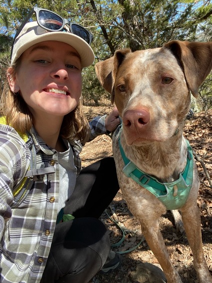 Wildlife Biologist Tiffany Hough and her dog